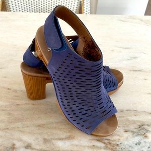 Dansko navy leather peep toe wedges.
